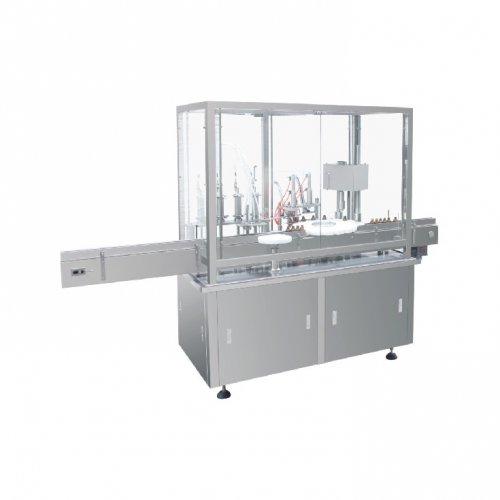 Filling, stoppering and capping machine